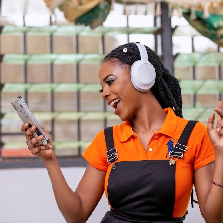 Mira Desai, Lead Design Curator at ReedSableTimber, reviewing corporate floral arrangements